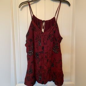 Maurices spaghetti strap cami with elastic waistband and keyhole tie back.